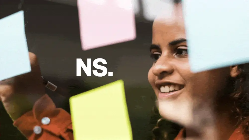 Post-it notes spelling NS.